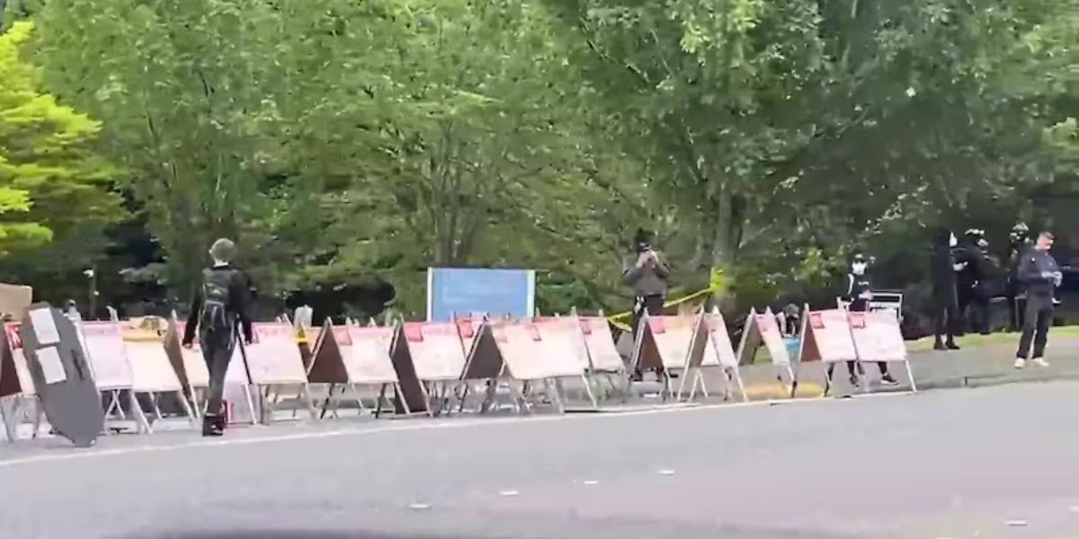 Frozen water bottles and shields were used in protest outside the Tukwila DHS facility, authorities said